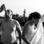 man driking beer with bride