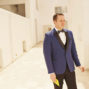 groom-with-blue-tuxedo-waiting-for-the-bride-in-santorini-elopement-day-